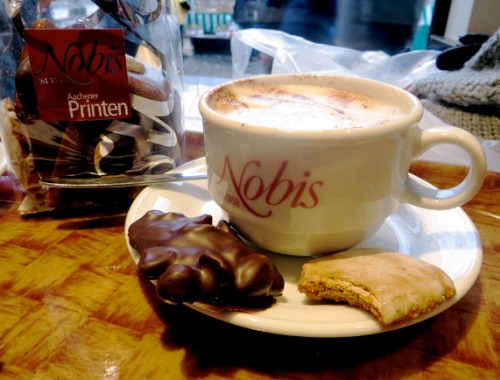 Cappuccino and Printen at Nobis cafe in Aachen, Germany